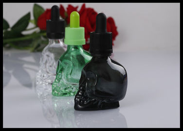 Porcellana Il contagoccia di vetro dell'olio essenziale del cranio 30ml imbottiglia la chiara bottiglia nera verde fornitore