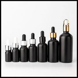 Porcellana Cosmetico glassato il nero delle bottiglie di vetro dell'olio essenziale di colore che imballa forma rotonda fornitore