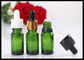 Alte bottiglie di vetro verdi del contagoccia di livello 10ml piccole per gli oli essenziali fornitore